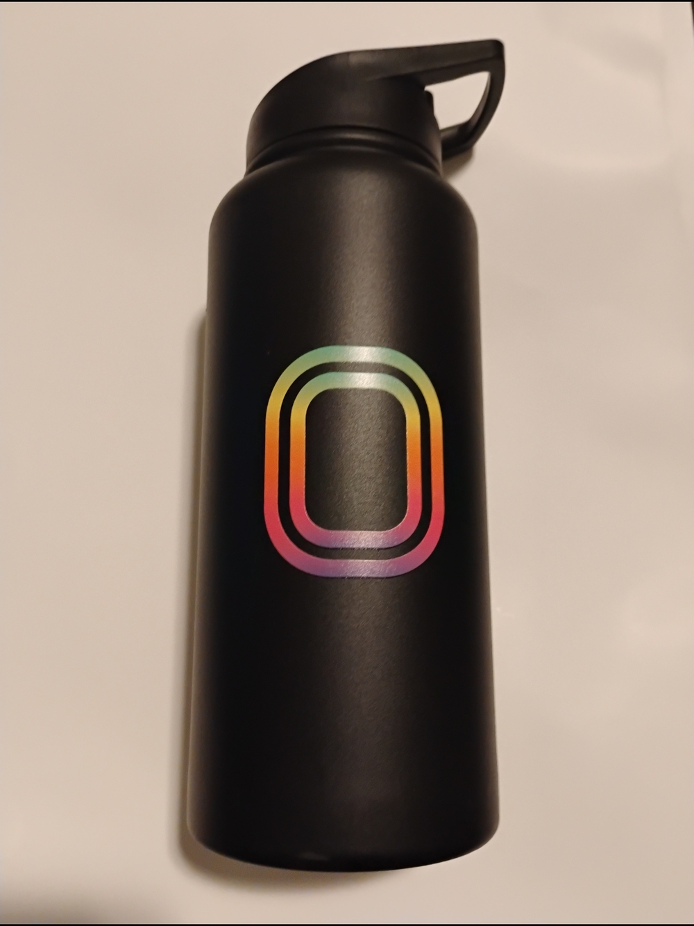 Black Stainless Steel Water Bottle with Rainbow Oval Logo